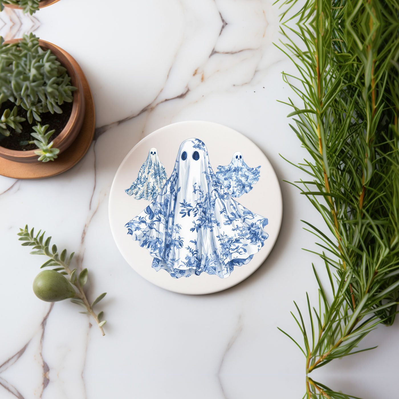 Blue and white Halloween chinoiserie coaster collection featuring 8 gothic designs with cork backing
Complete set of Halloween coasters in elegant blue and white chinoiserie style on marble surface
Luxury Halloween decor coasters with skull, ghost, and pumpkin designs in blue willow style